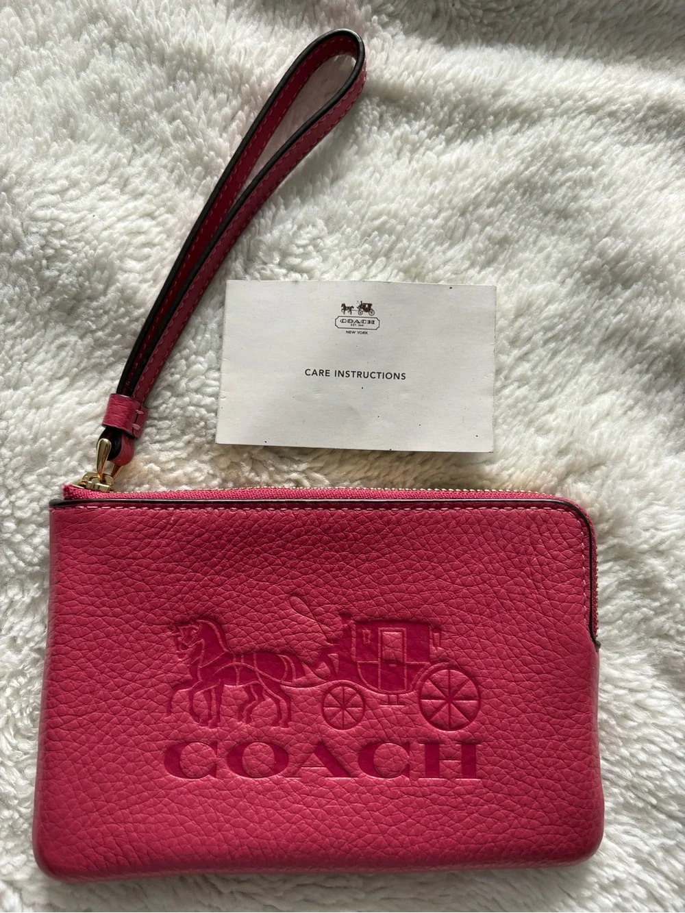 Like New Coach Pink Pebbled Leather Wristlet with Embossed Logo